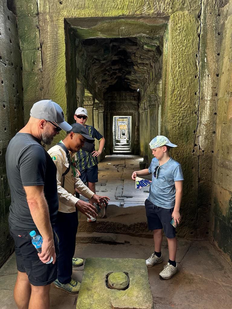 Ra the tour guide with a traveler visiting siem reap, Cambodia